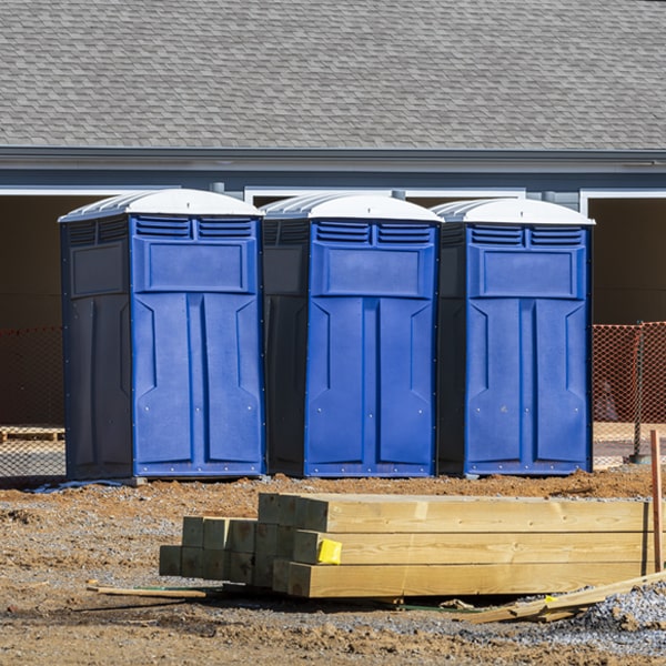 how often are the porta potties cleaned and serviced during a rental period in Woodlawn